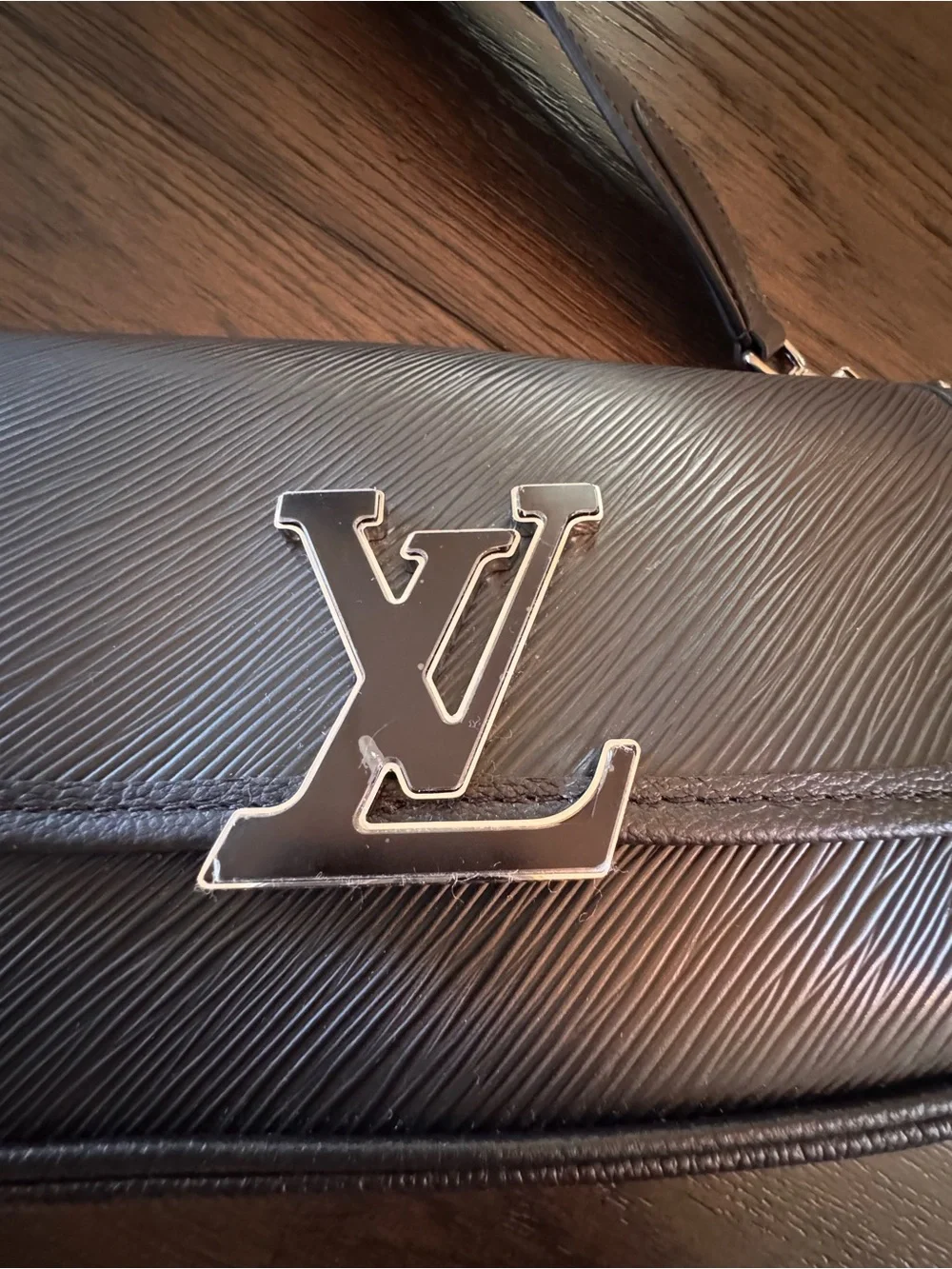 Brand new Louis Vuitton Black Buci bag with 2 Louis Vuitton straps.
